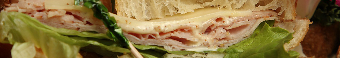 Eating Sandwich at Jaho Coffee Roaster & Wine Bar restaurant in Salem, MA.
